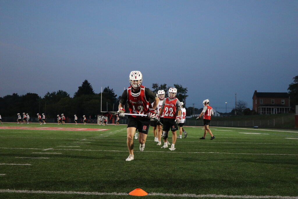 Men's Lacrosse Grove City doing a footwork drill