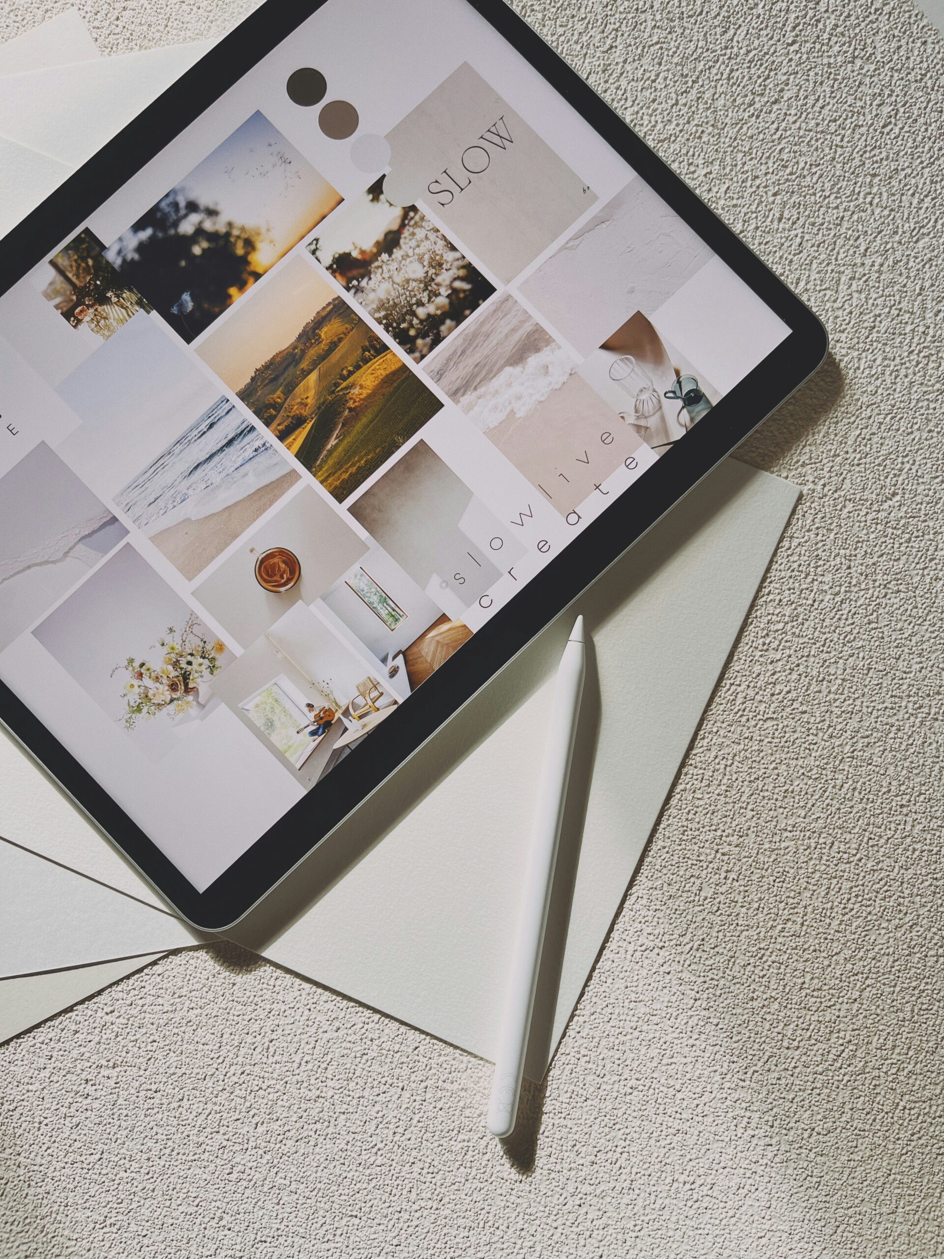 An ipad showing a mood board and color palette in a branding guide, which is important when creating a user-friendly website